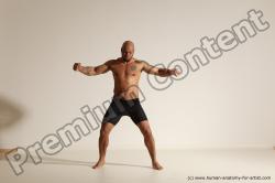 Underwear Gymnastic poses Man Black Muscular Bald Dancing Dynamic poses Academic